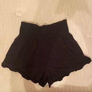 Black Shorts - tight on the waist loose on the legs